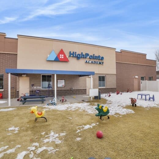 Building with "HighPointe Academy" on the side.