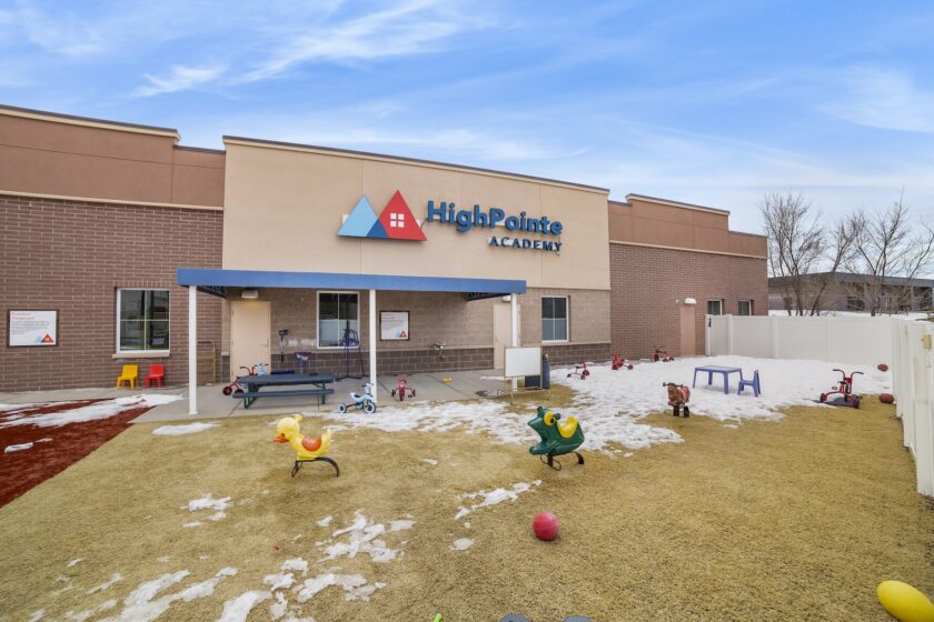 Building with "HighPointe Academy" on the side.