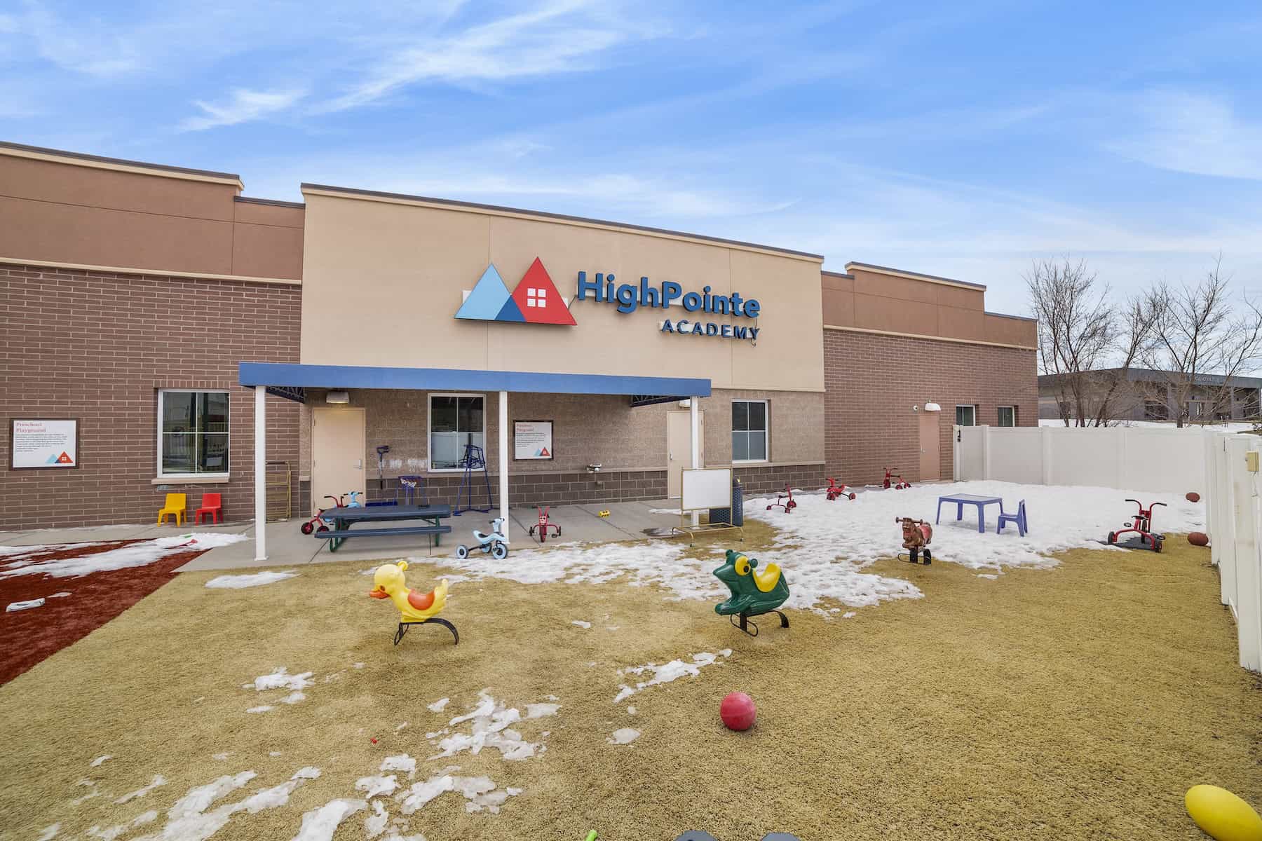Building with "HighPointe Academy" on the side.