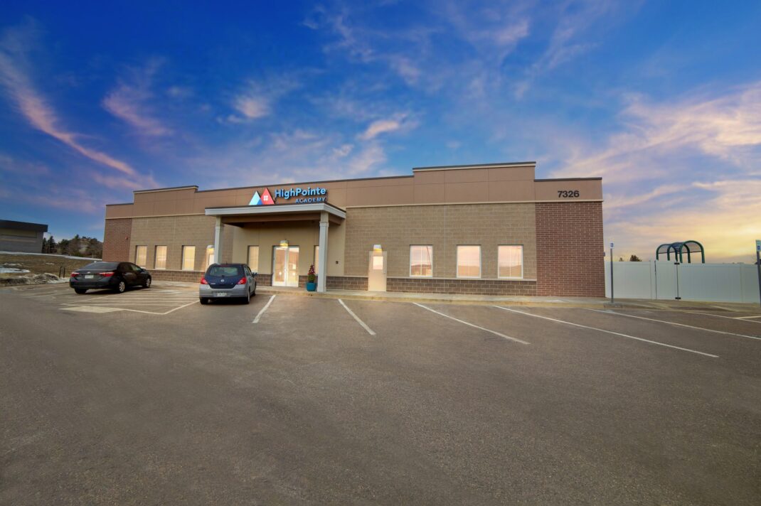 Building with "HighPointe Academy" on the side.