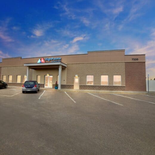 Building with "HighPointe Academy" on the side.