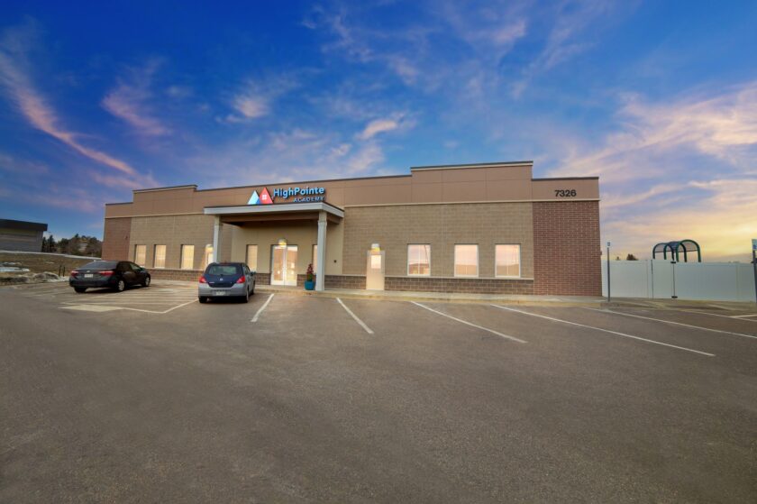 Building with "HighPointe Academy" on the side.